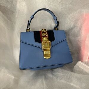 Blue Leather Handbag with Gold Accents